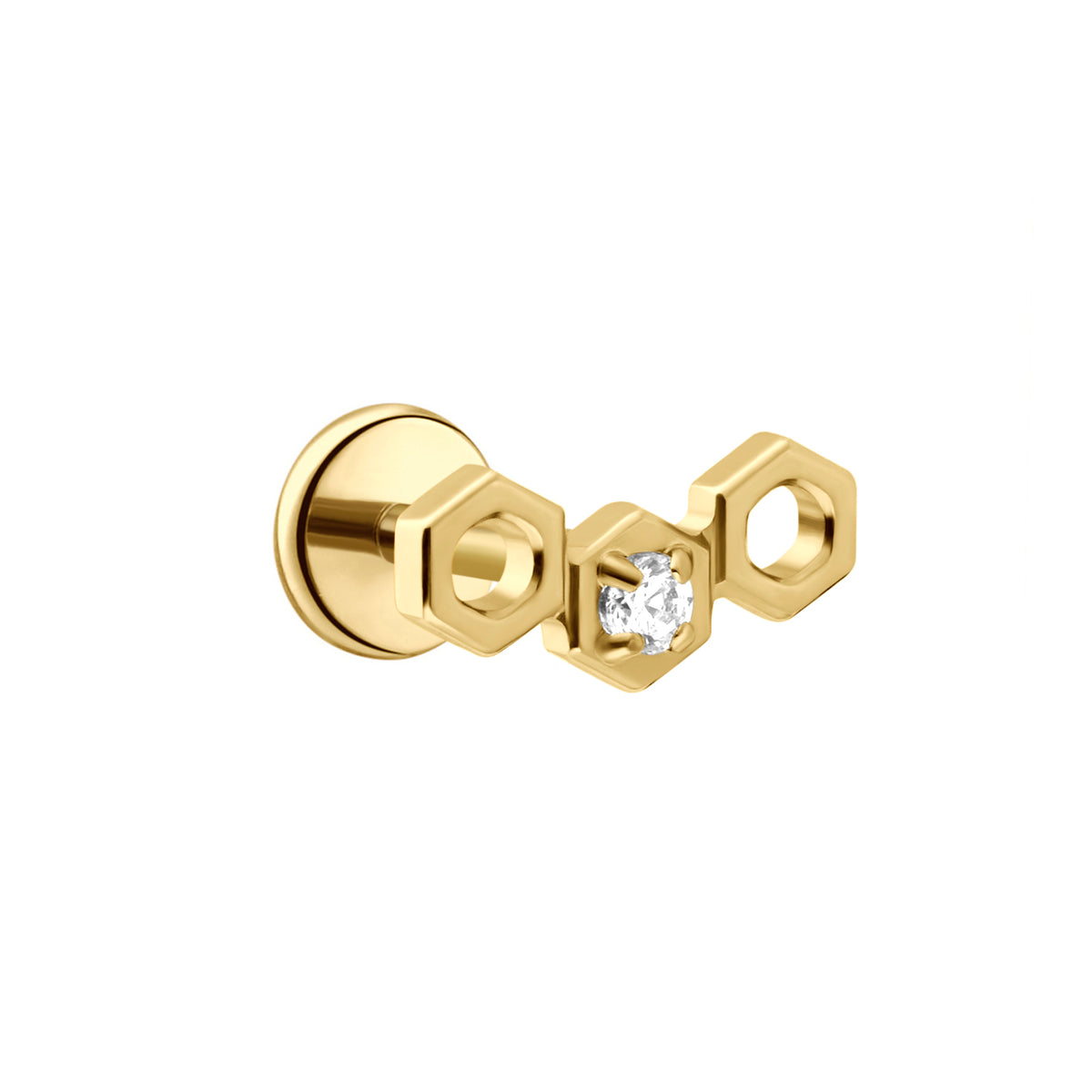 Close up of a hexagon shaped flat back stud earring made from 18k gold-plated ASTM F136 implant-grade titanium, with a clear zirconia stone, against a white background.