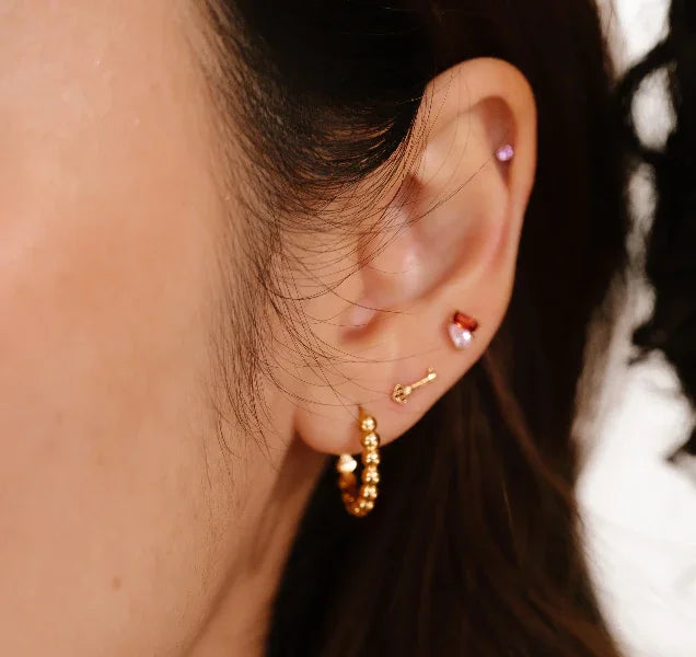 Why do Earrings hurt my ears