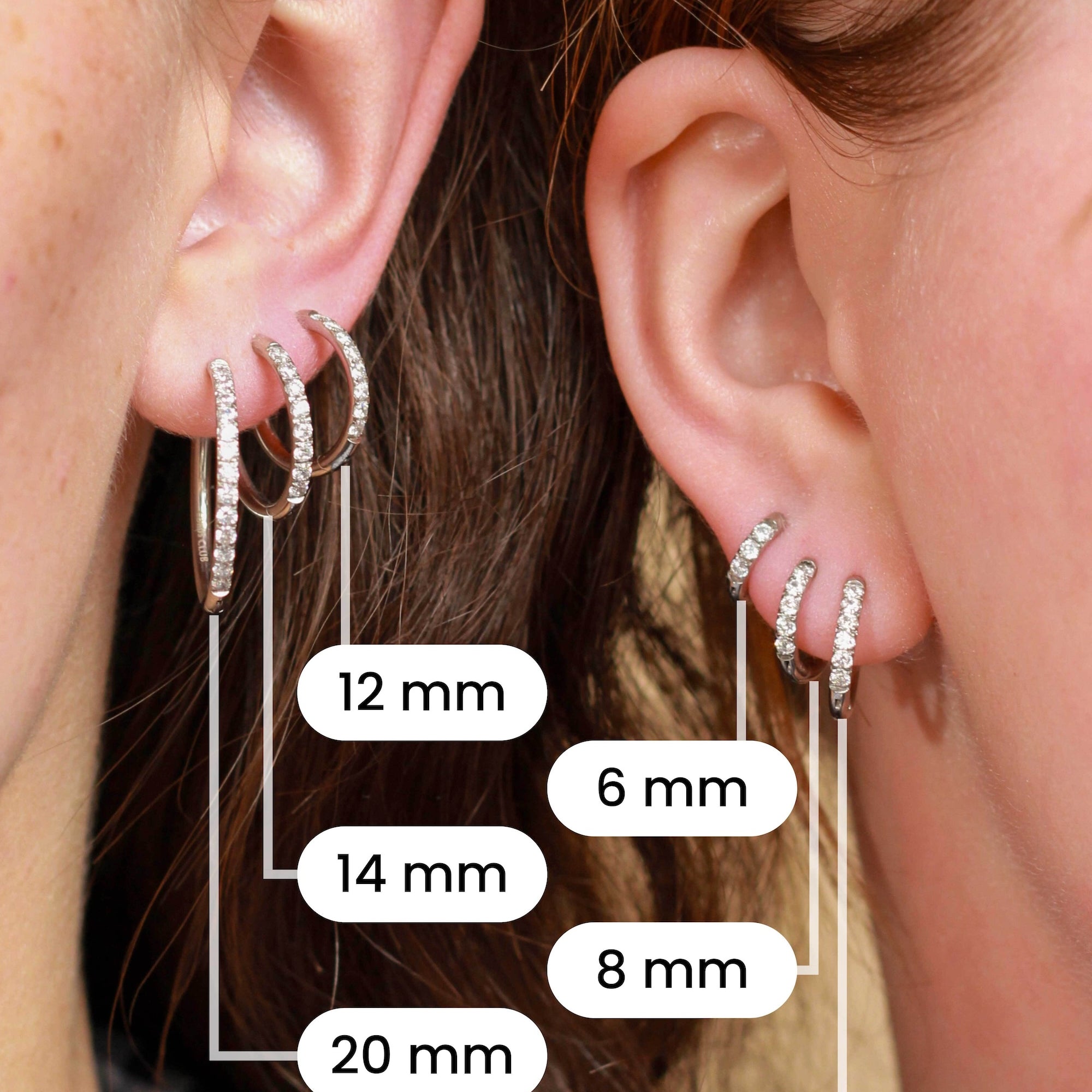 Comparison of 6 different sizes of silver hoops on the ears of 2 models.