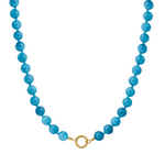 Blue beaded necklace with a gold clasp on a white background