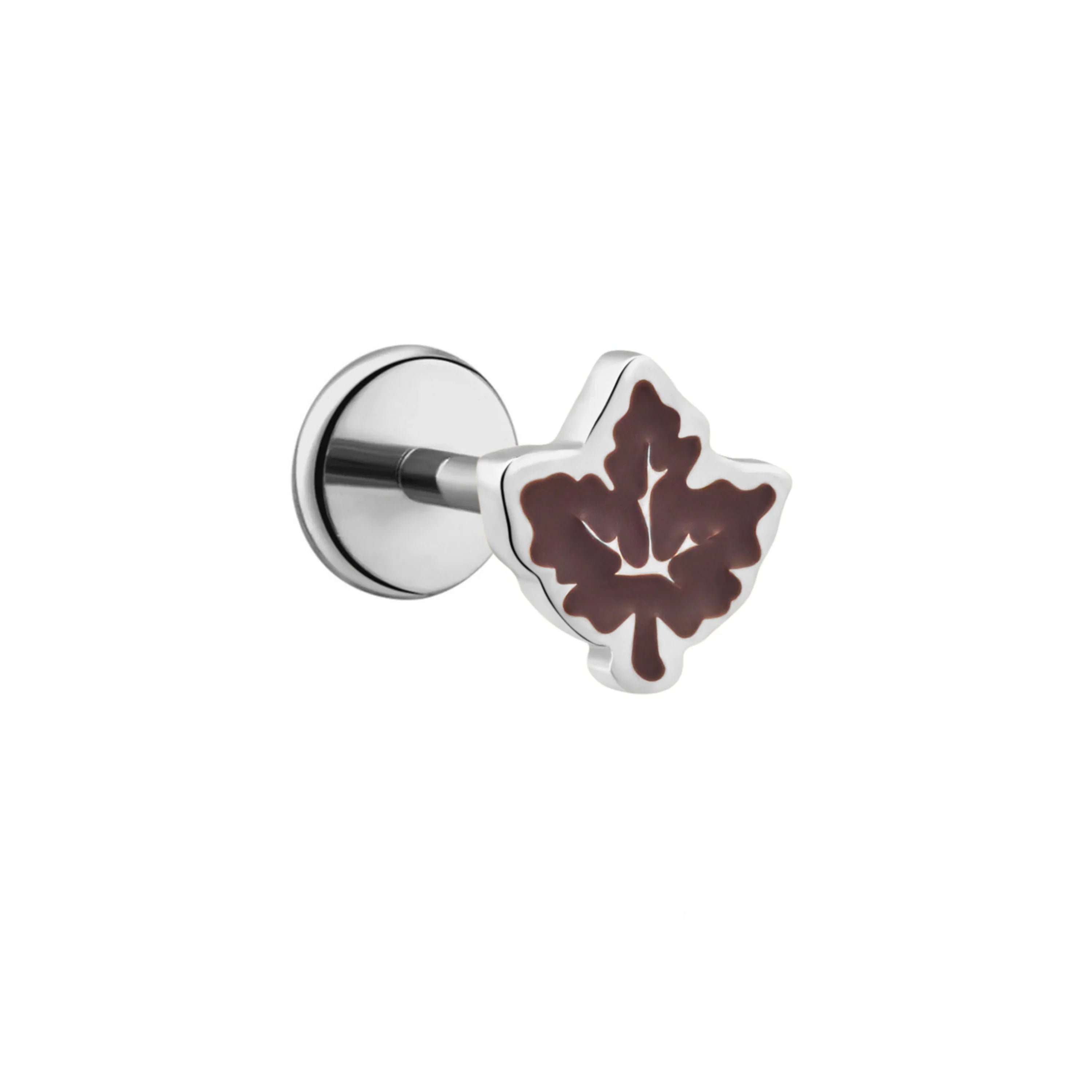 Close up of a silver titanium flat back stud earring with a brown enamel maple leaf design on a white background