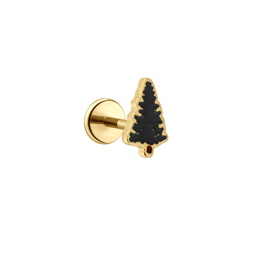 Gold-colored earring with dark green pine tree design on a white background