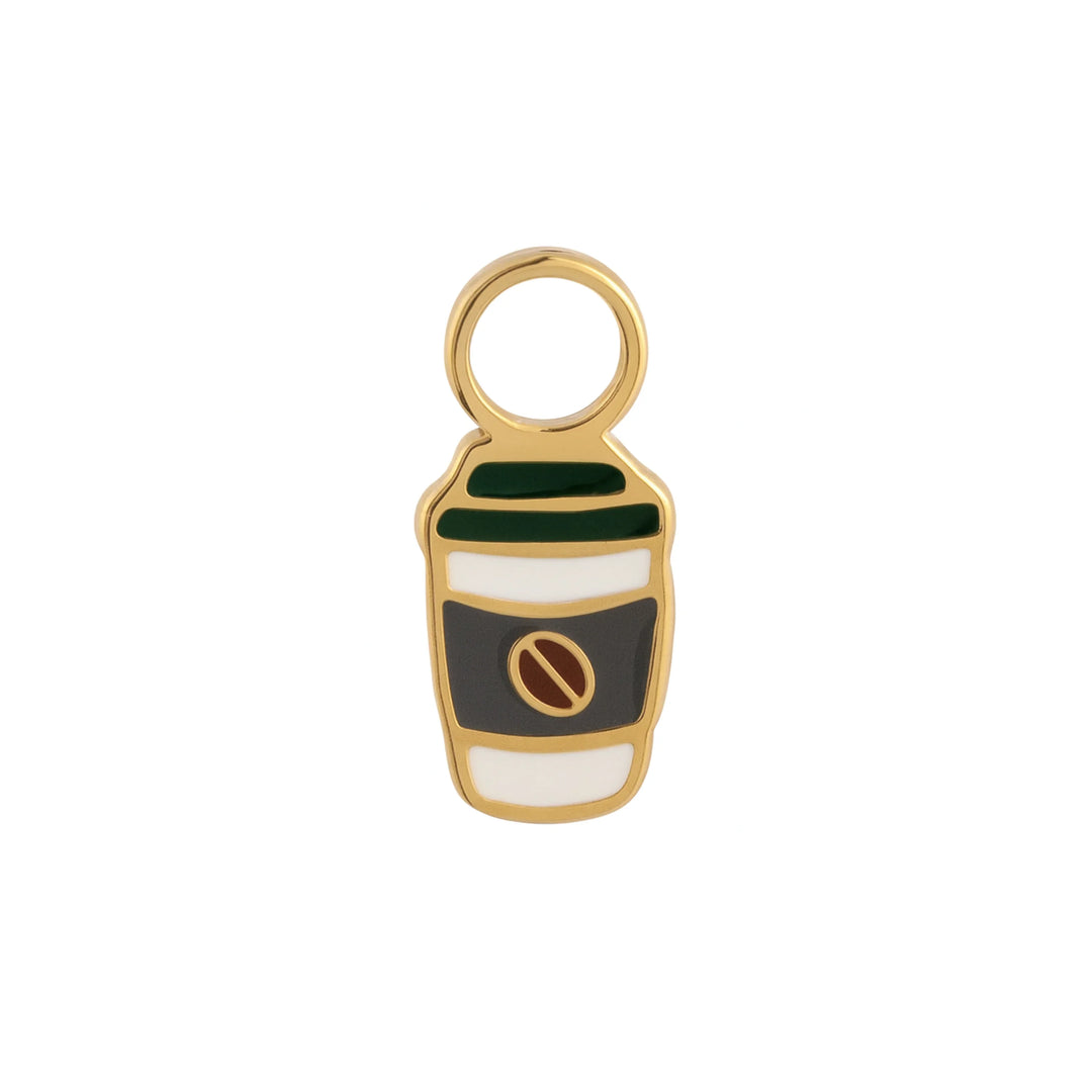 Gold and enamel coffee cup charm on a white background