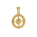 Gold compass pendant on a white background