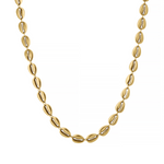 Gold necklace with cowrie-shell-like beads on a white background
