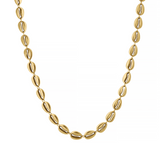 Gold necklace with cowrie-shell-like beads on a white background