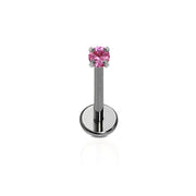 A single ASTM F136 implant grade titanium push-pin flat back stud with a pink zirconia stone, displayed against a white background.