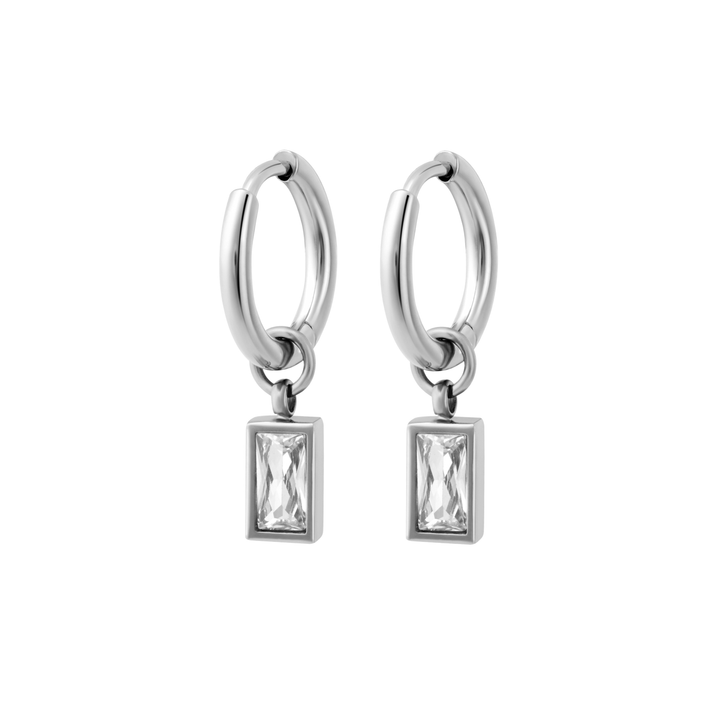Silver hoop earrings with rectangular gemstones on a white background