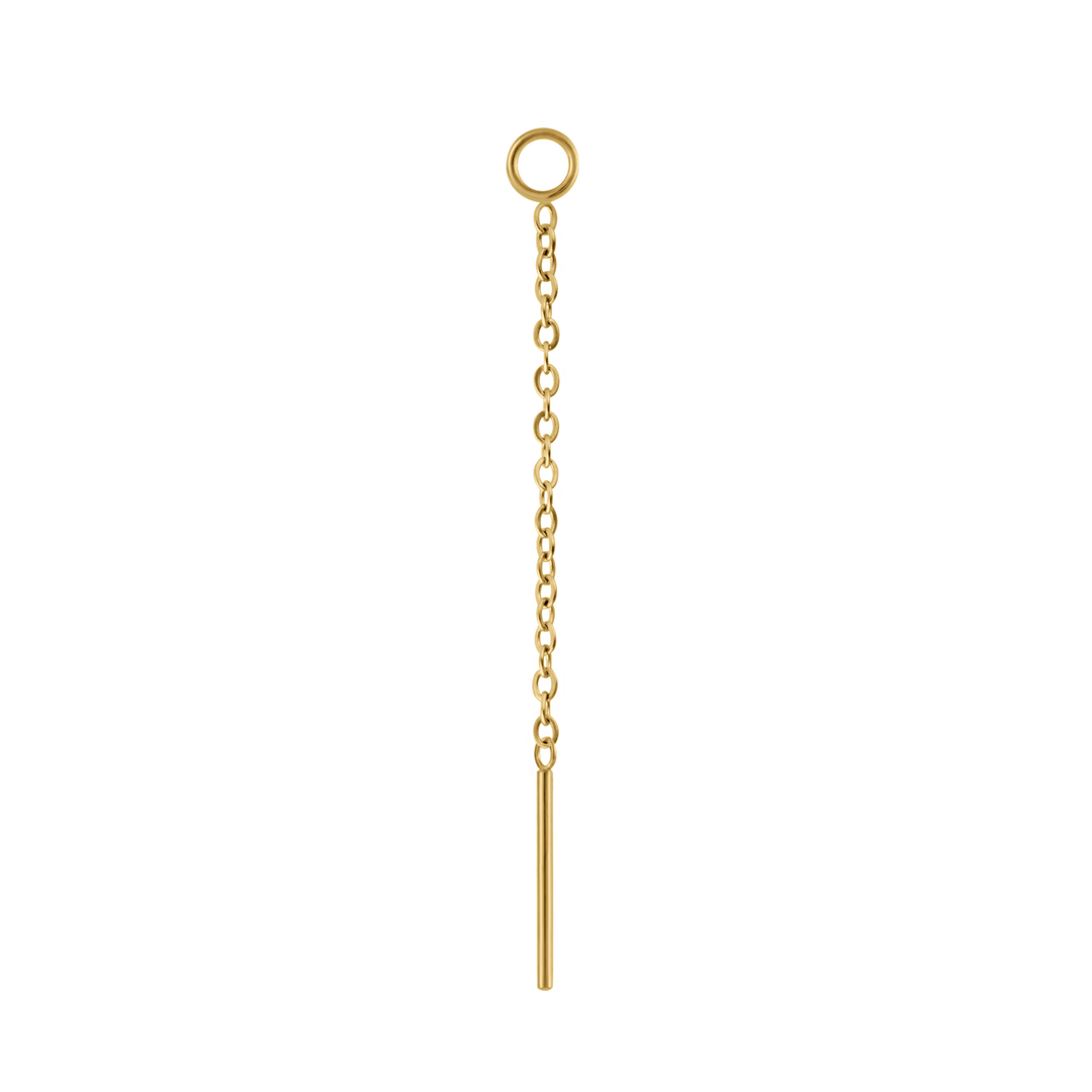 Close up on an earring accessory that features a thin chain with a small ring at one end, and a small rod at the other. The ring is is designed to link with another earring, like a hoop or a flat back stud, and the chain and rod are designed to thread through another peircing, or hang like a charm. Made from 316L Surgical steel and finished with 18k Gold PVD plating. 