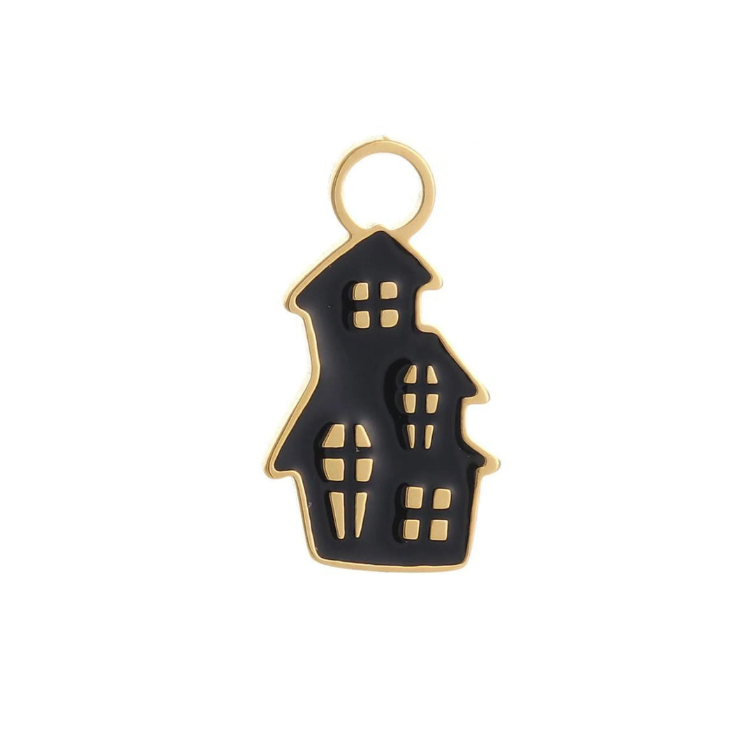 Black and gold haunted house-shaped charm on a white background