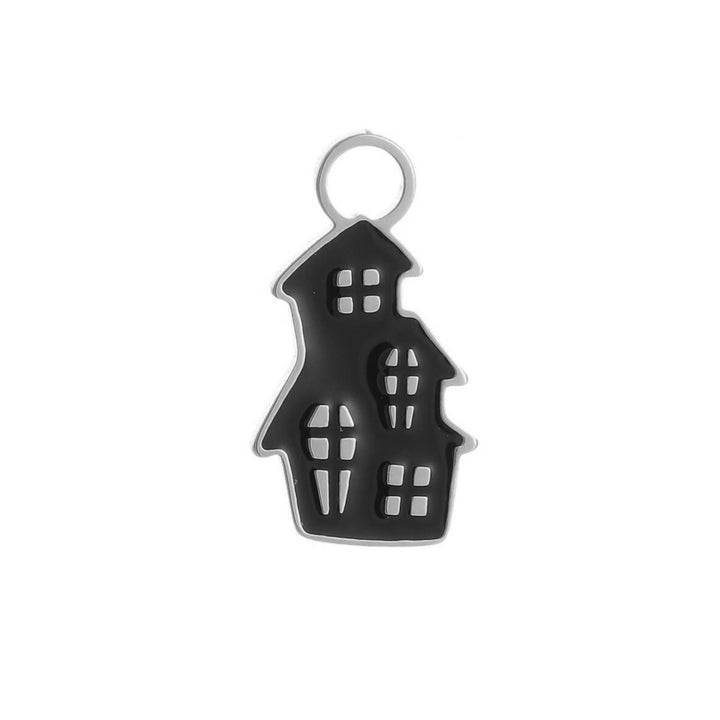 Black and silver haunted house-shaped charm on a white background