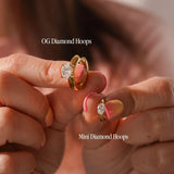 Size comparison of OG Diamond Hoops and Mini Diamond Hoops on a blurred background