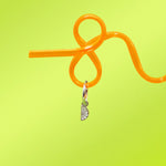 Orange straw with a silver 3D Lime wedge charm on a yellow-green background