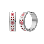 A close up of a hoop earring made from titanium metal, with folk-art style floral patterns in pink, dark pink, and white enamel, on a white background.