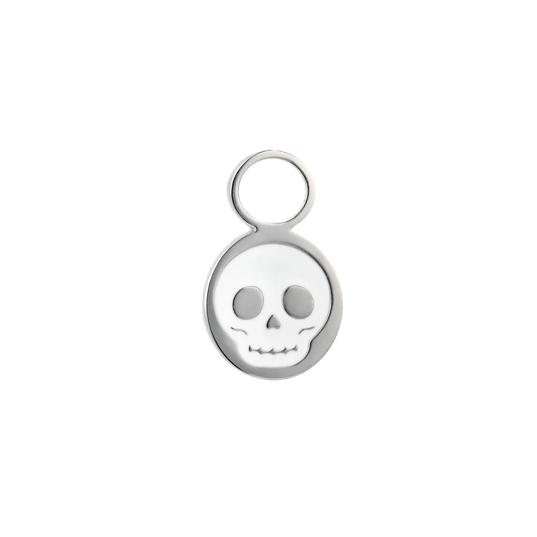Silver hoop charm with a white enamel skull design on a white background