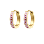 Gold hoop earrings with red heart designs on a white background