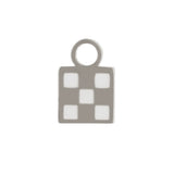 Silver charm with a  checkered white enamel design on a white background