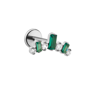 earring with green gemstones on a white background