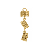A gold charm featuring three dangling open book charms of varying directions, shown against a plain white background.