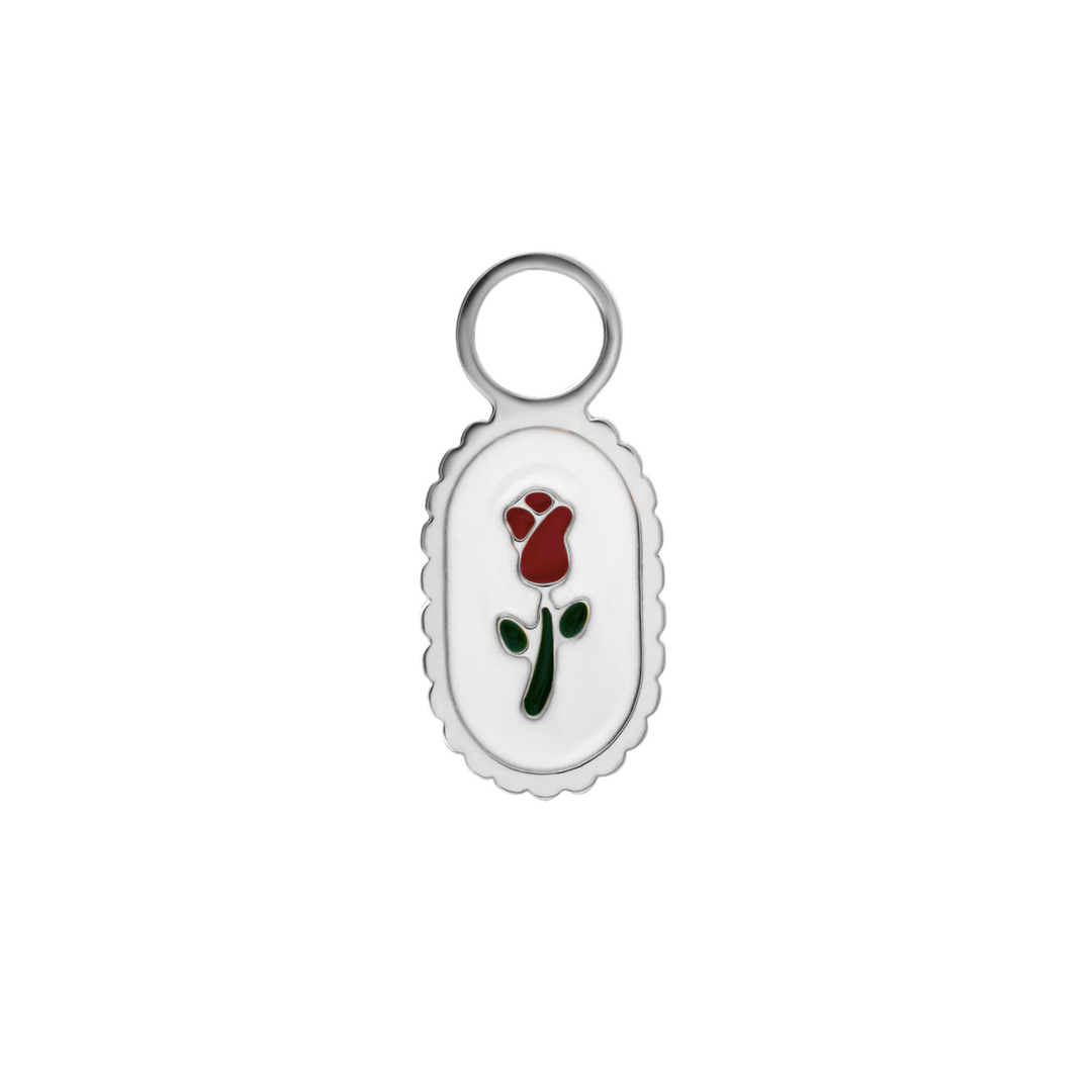 Small oval charm with a red rose design on a white background