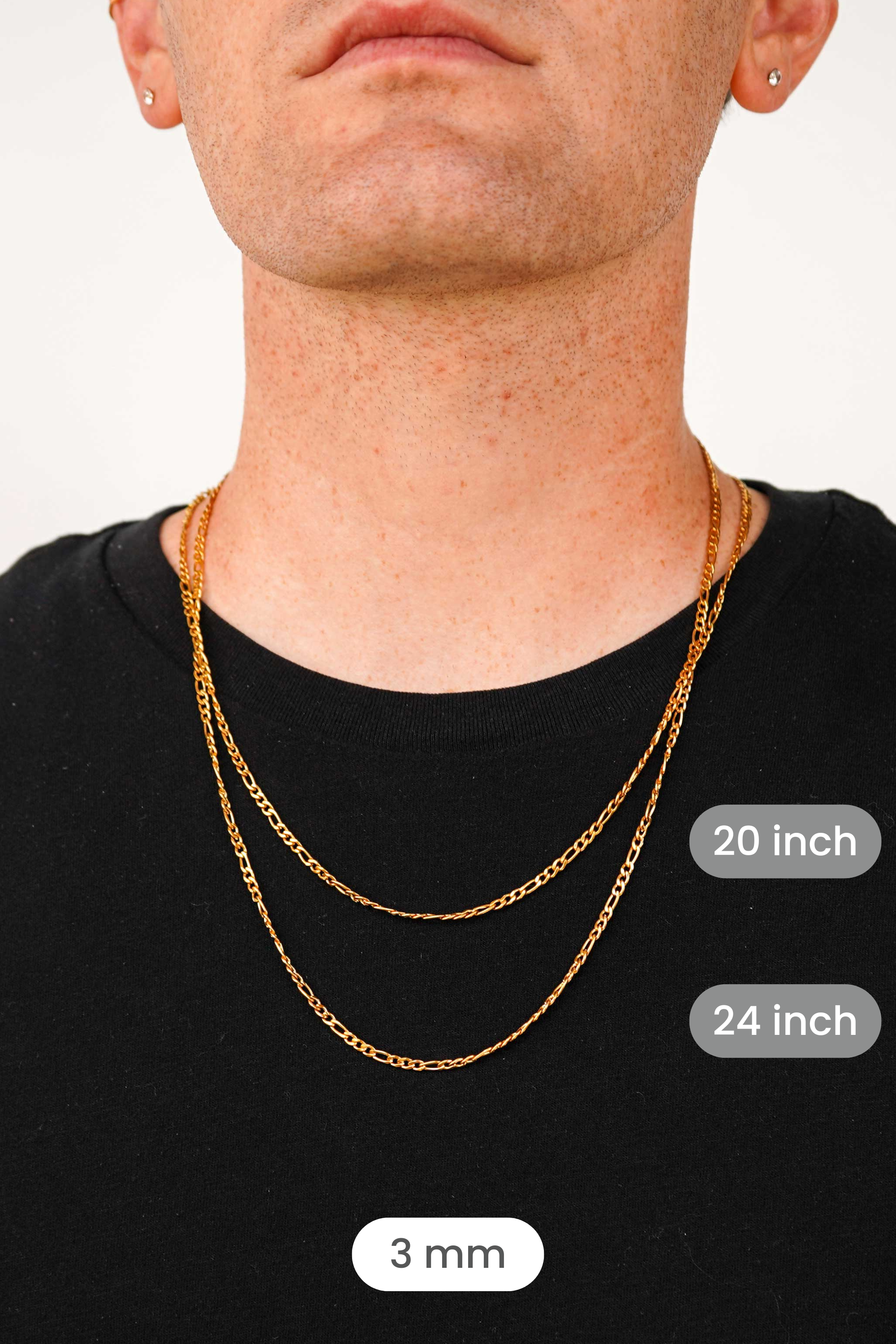 A close-up of a man's neck and lower face wearing two layered gold chains over a black t-shirt. White text labels indicate the chain lengths: 20 inch, 24 inch, and 3 mm.