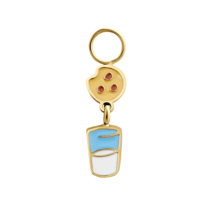 Gold enamel hoop charm resembling a chocolate chip cookie suspended over a cup of milk on a white background