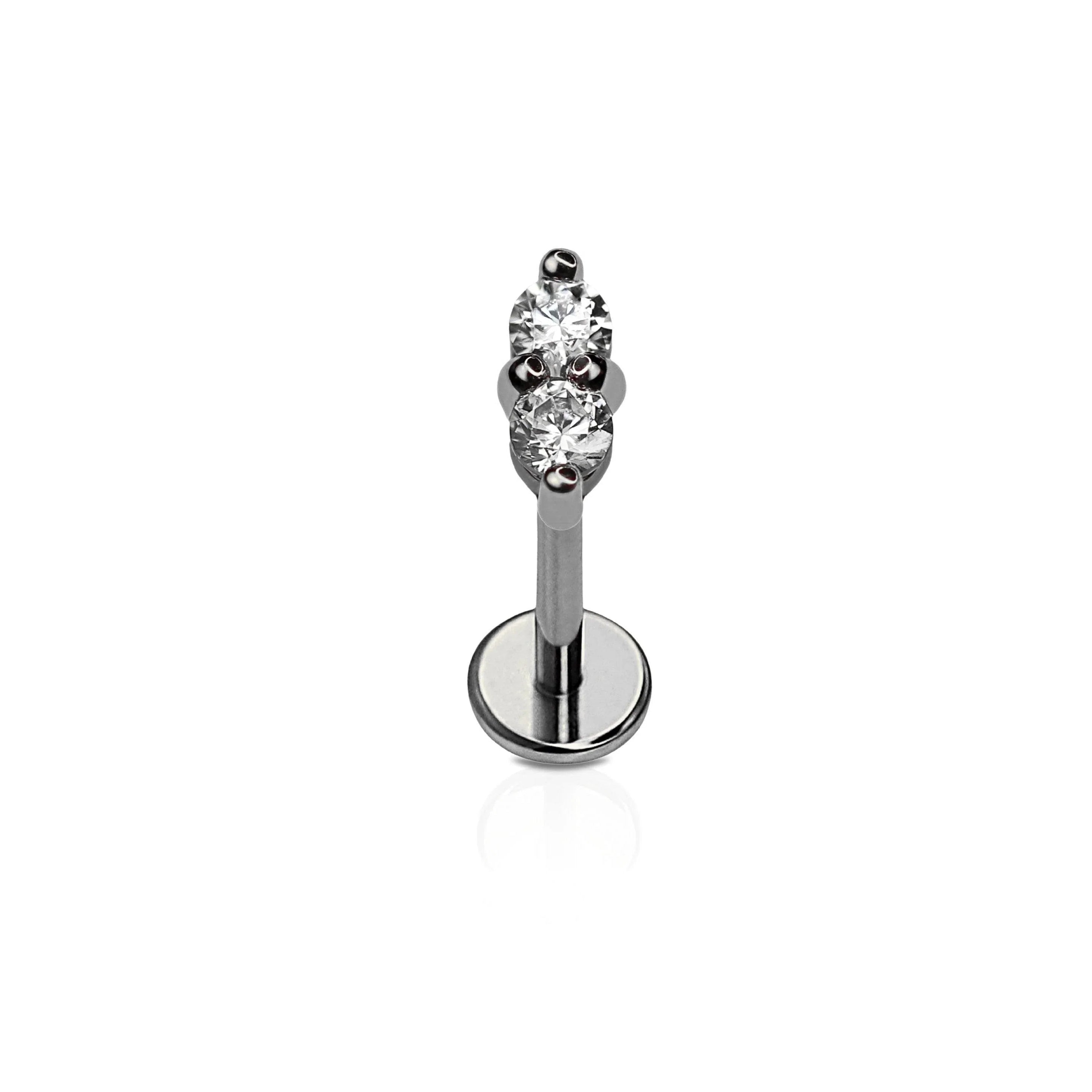 Silver flat back stud with two clear gemstones on a white background