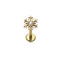 Gold snowflake-shaped flat back stud earring with a central clear gemstone on a white background