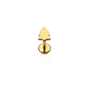 Gold-colored tree-shaped earring on a white background